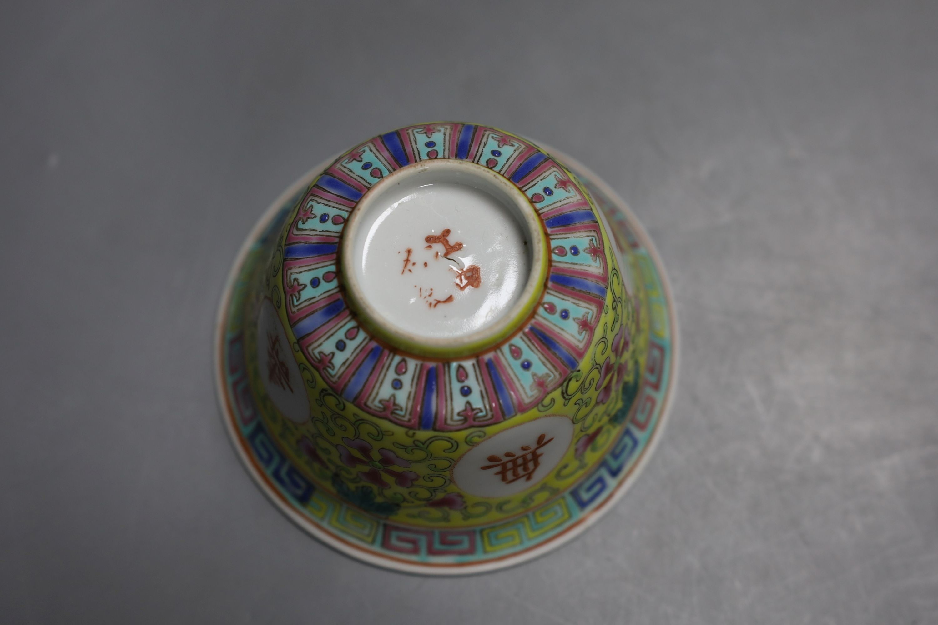 A Chinese yellow ground ‘dragon’ stem cup, a clobbered dish and two other pieces